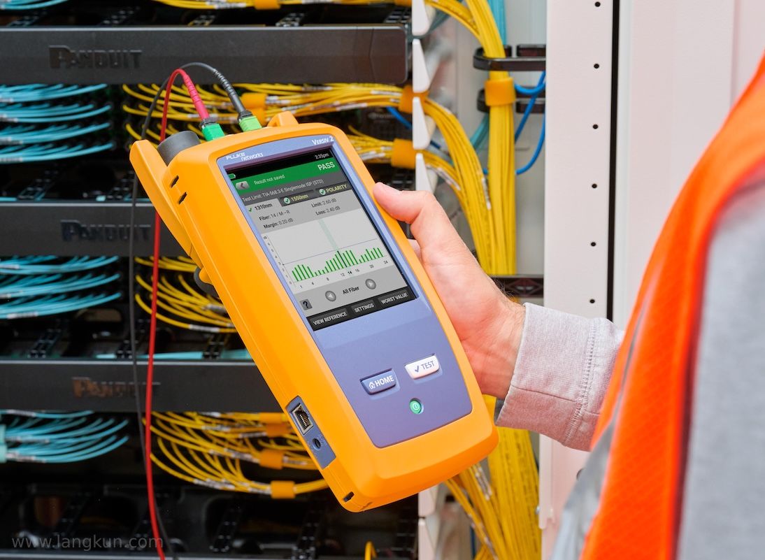 A CertiFiber Max tester connected to a multi-fiber MPO link.
